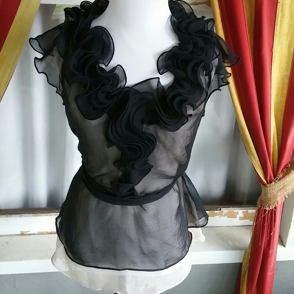 Woman's beautiful black ruffle top
